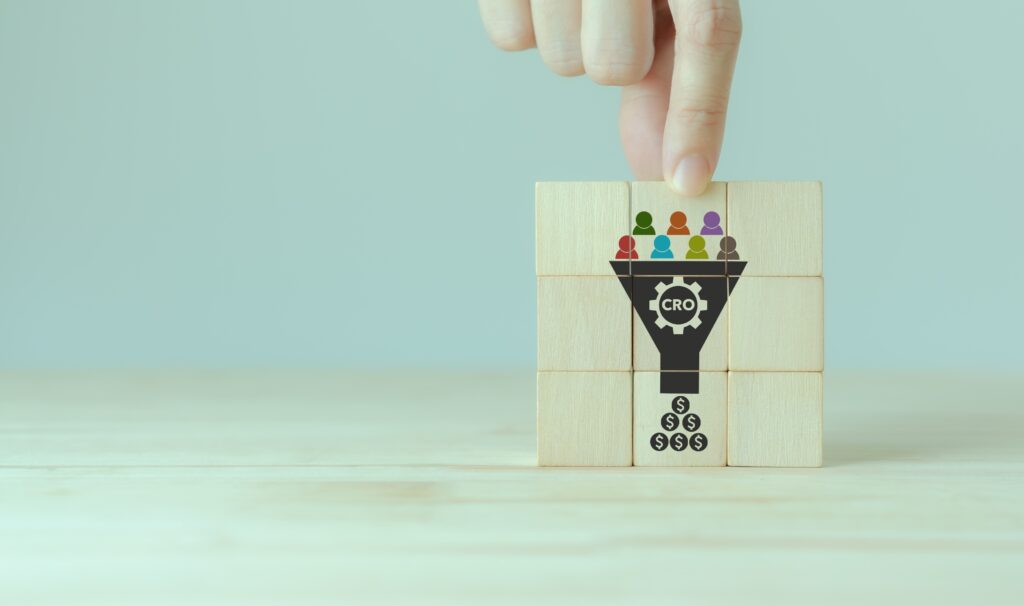 Graphic illustrating conversion rate optimization with a funnel, lead generation, and revenue growth.