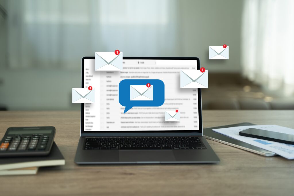 Laptop screen displaying an email inbox with multiple new message notifications, representing email marketing and digital communication.