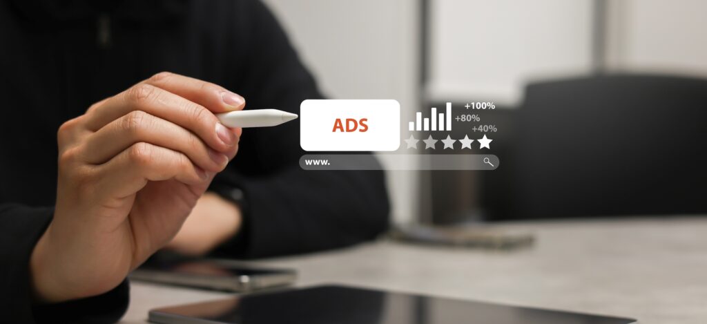 Businessman holding a stylus pen, pointing at a digital PPC ad interface, symbolizing online advertising and marketing strategy.